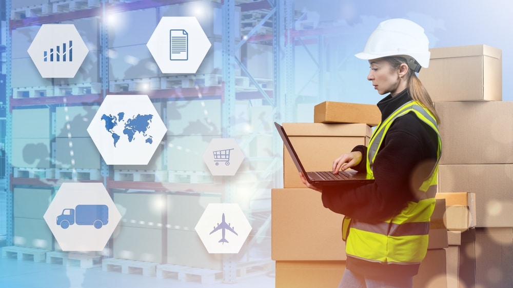 female professional using logistics management system with graphic icons